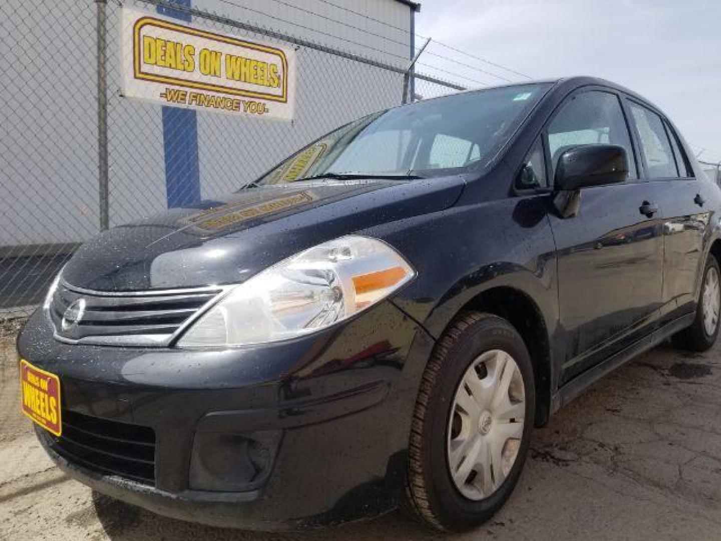 2011 Nissan Versa 1.8S (3N1BC1APXBL) with an 1.8L I-4 DOHC engine, located at 601 E. Idaho St., Kalispell, MT, 59901, 0.000000, 0.000000 - Photo#2