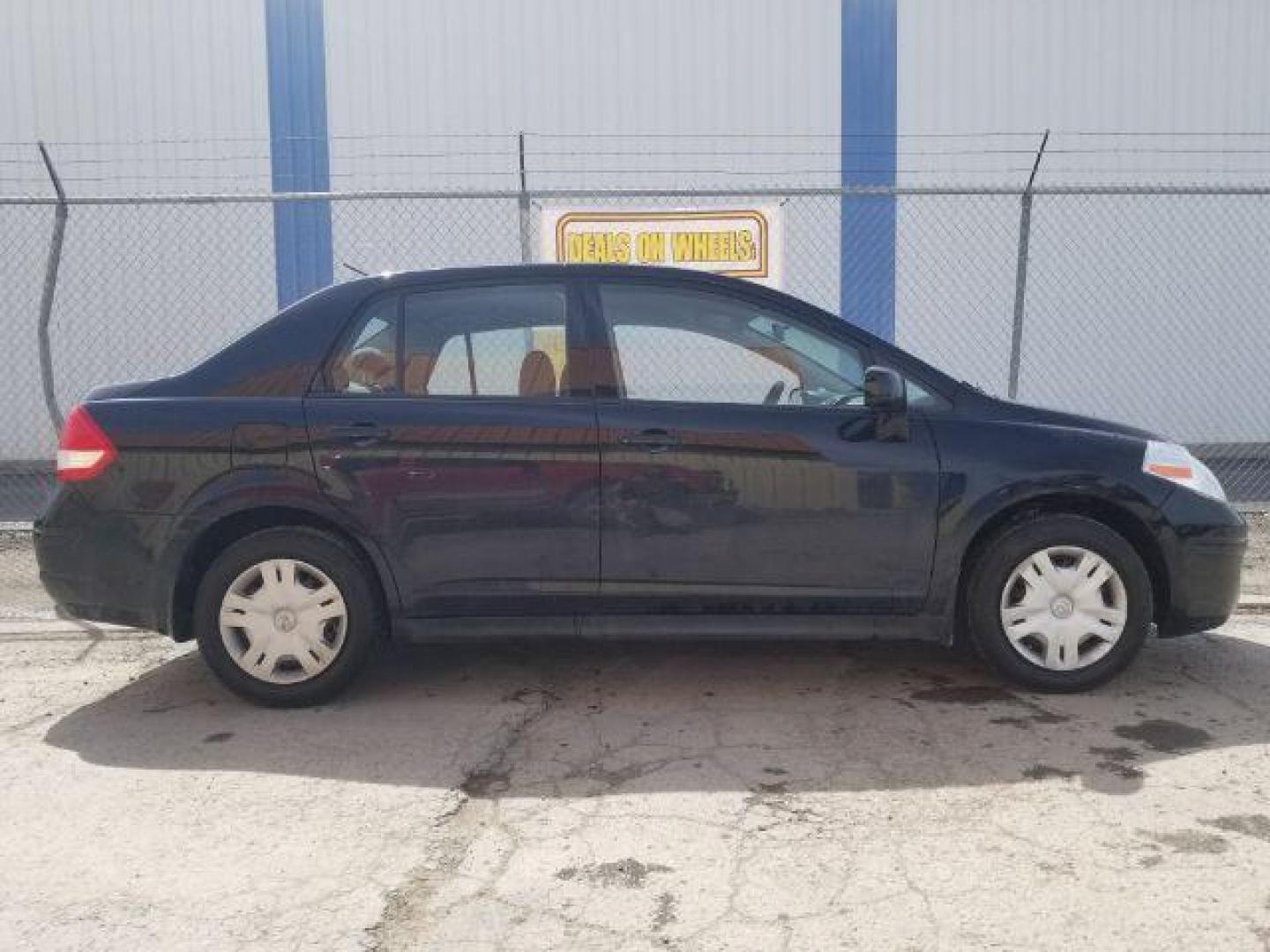 2011 Nissan Versa 1.8S (3N1BC1APXBL) with an 1.8L I-4 DOHC engine, located at 601 E. Idaho St., Kalispell, MT, 59901, 0.000000, 0.000000 - Photo#3