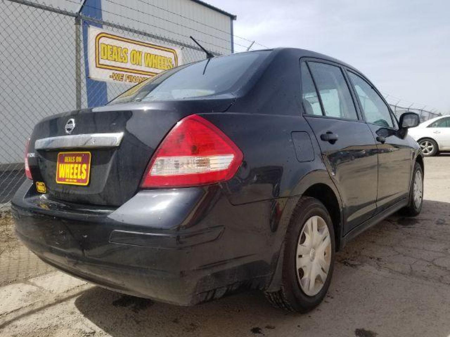 2011 Nissan Versa 1.8S (3N1BC1APXBL) with an 1.8L I-4 DOHC engine, located at 601 E. Idaho St., Kalispell, MT, 59901, 0.000000, 0.000000 - Photo#4