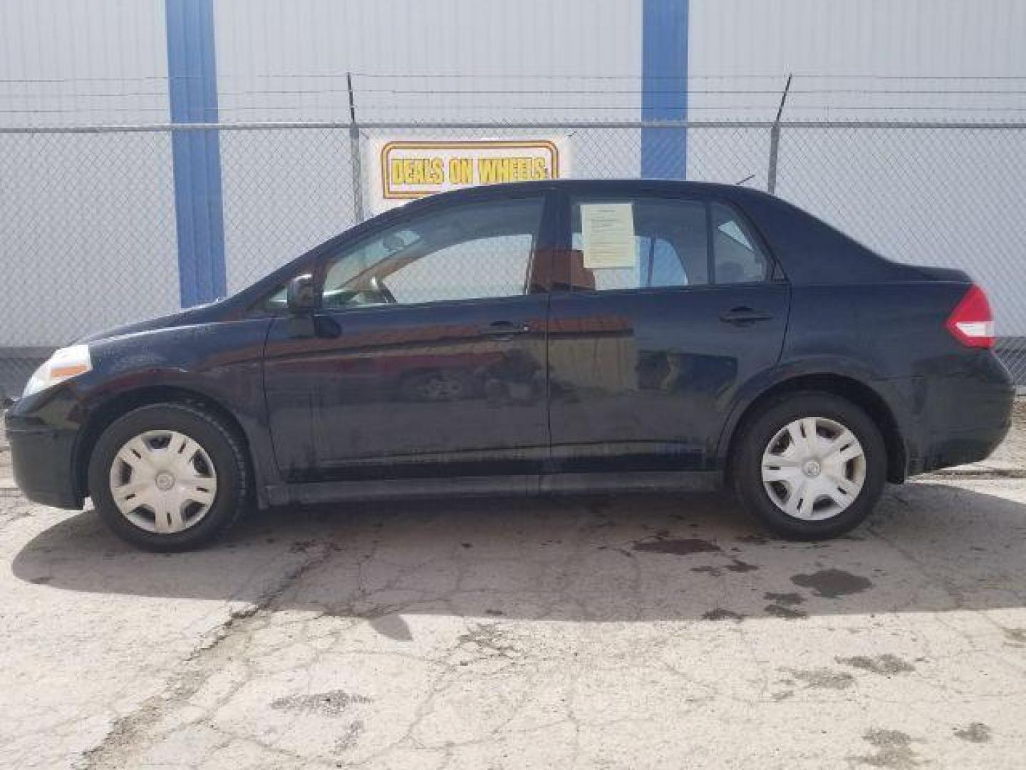 2011 Nissan Versa 1.8S (3N1BC1APXBL) with an 1.8L I-4 DOHC engine, located at 601 E. Idaho St., Kalispell, MT, 59901, 0.000000, 0.000000 - Photo#6