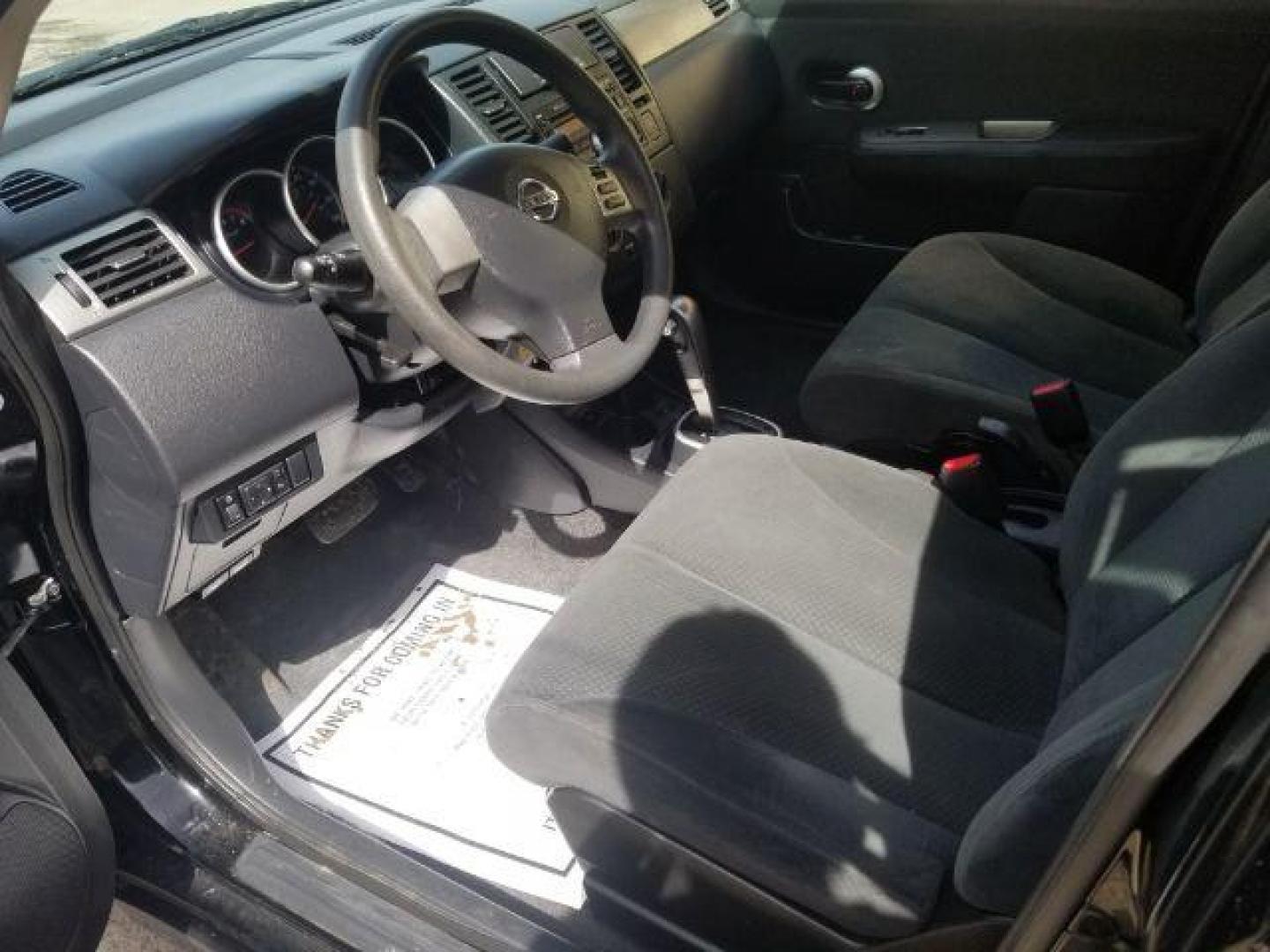 2011 Nissan Versa 1.8S (3N1BC1APXBL) with an 1.8L I-4 DOHC engine, located at 601 E. Idaho St., Kalispell, MT, 59901, 0.000000, 0.000000 - Photo#7