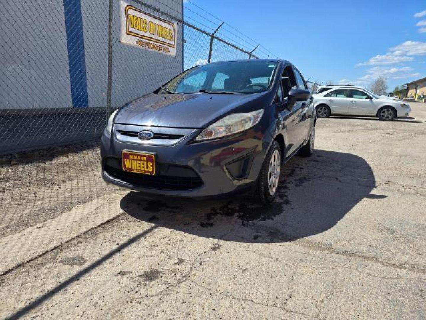 2011 Nissan Versa 1.8S (3N1BC1CP3BL) with an 1.8L I-4 DOHC engine, located at 1800 West Broadway, Missoula, 59808, (406) 543-1986, 46.881348, -114.023628 - Photo#0