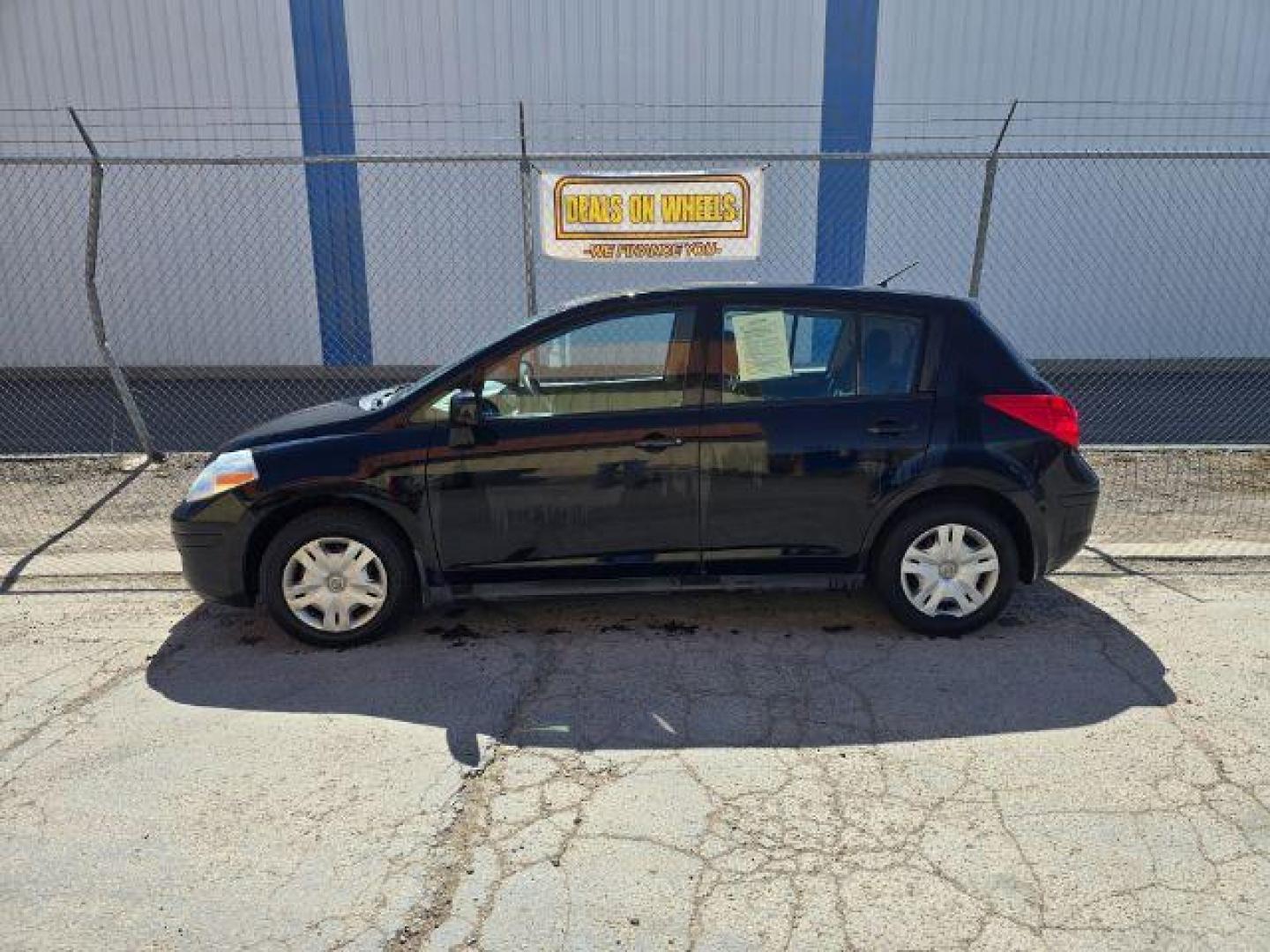 2011 Nissan Versa 1.8S (3N1BC1CP3BL) with an 1.8L I-4 DOHC engine, located at 1800 West Broadway, Missoula, 59808, (406) 543-1986, 46.881348, -114.023628 - Photo#2