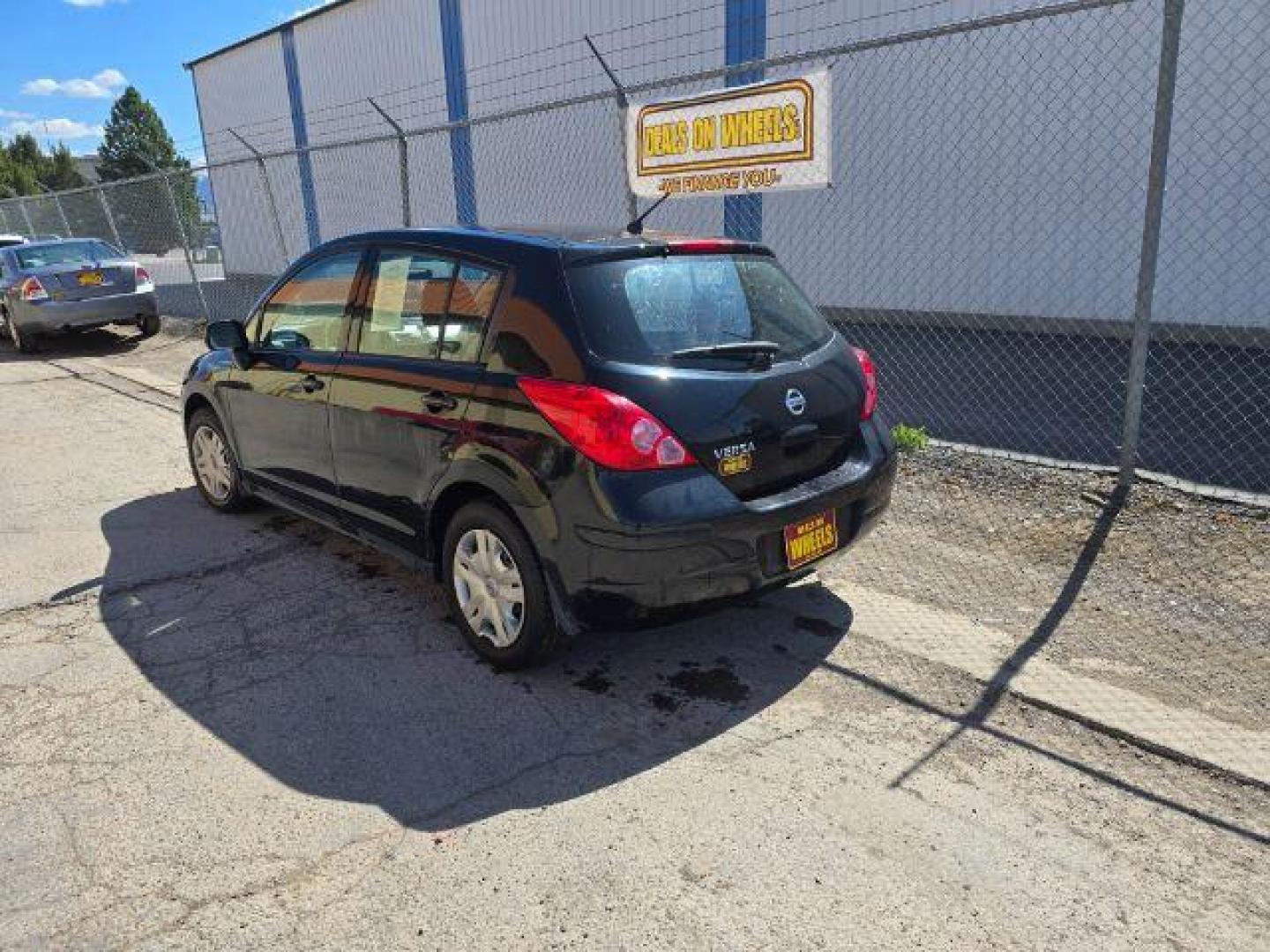 2011 Nissan Versa 1.8S (3N1BC1CP3BL) with an 1.8L I-4 DOHC engine, located at 1800 West Broadway, Missoula, 59808, (406) 543-1986, 46.881348, -114.023628 - Photo#3