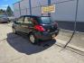 2011 Nissan Versa 1.8S (3N1BC1CP3BL) with an 1.8L I-4 DOHC engine, located at 1800 West Broadway, Missoula, 59808, (406) 543-1986, 46.881348, -114.023628 - Photo#3