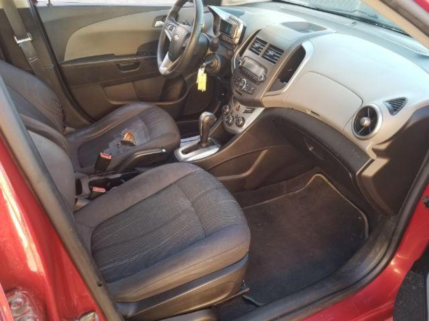 2012 Victory Red Chevrolet Sonic 2LT Sedan (1G1JC5SH9C4) with an 1.8L L4 DOHC 24V engine, 6-Speed Automatic transmission, located at 1821 N Montana Ave., Helena, MT, 59601, (406) 422-1031, 0.000000, 0.000000 - Photo#11