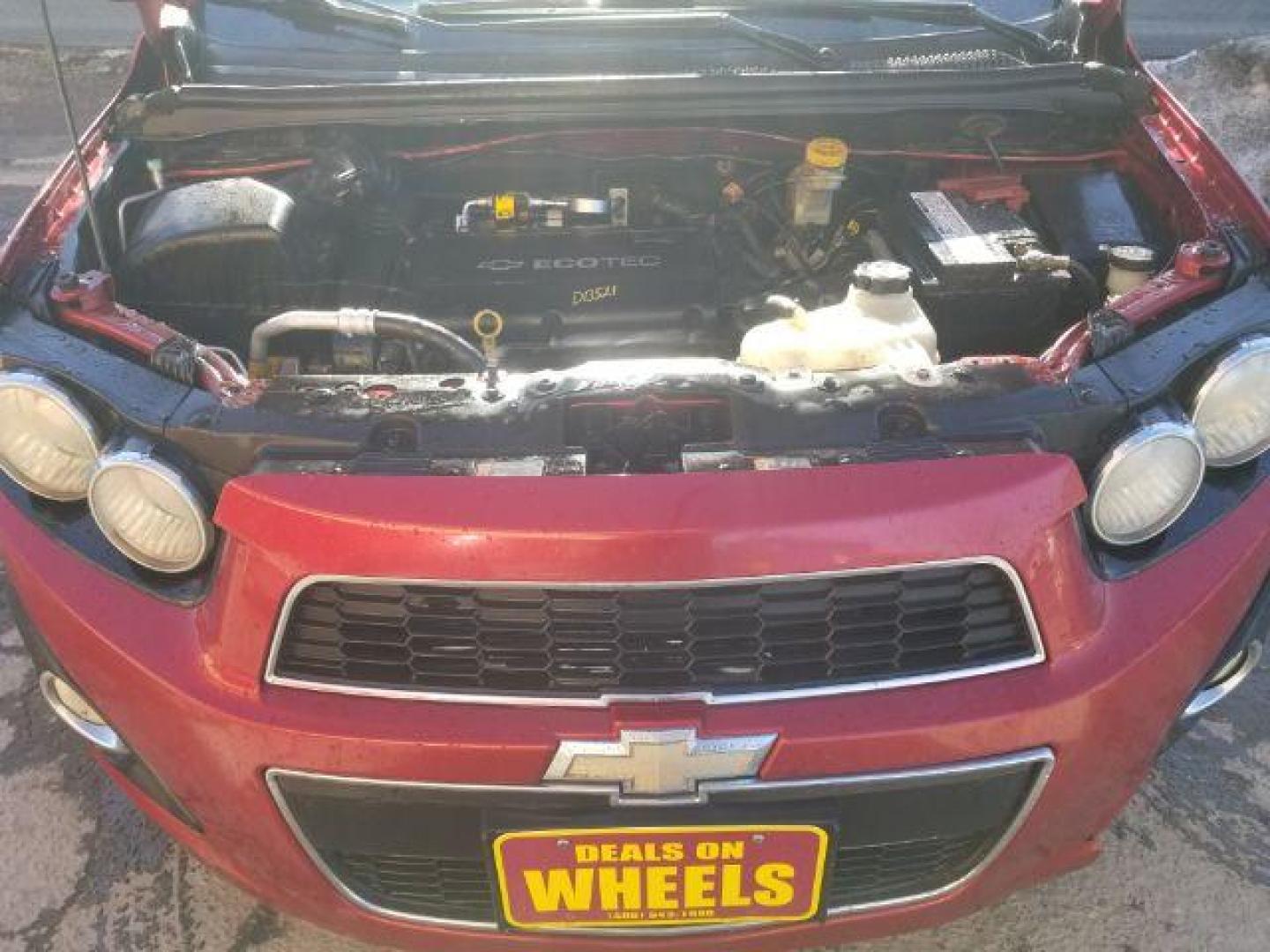 2012 Victory Red Chevrolet Sonic 2LT Sedan (1G1JC5SH9C4) with an 1.8L L4 DOHC 24V engine, 6-Speed Automatic transmission, located at 1821 N Montana Ave., Helena, MT, 59601, (406) 422-1031, 0.000000, 0.000000 - Photo#13