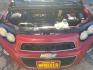 2012 Victory Red Chevrolet Sonic 2LT Sedan (1G1JC5SH9C4) with an 1.8L L4 DOHC 24V engine, 6-Speed Automatic transmission, located at 1821 N Montana Ave., Helena, MT, 59601, (406) 422-1031, 0.000000, 0.000000 - Photo#13
