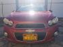 2012 Victory Red Chevrolet Sonic 2LT Sedan (1G1JC5SH9C4) with an 1.8L L4 DOHC 24V engine, 6-Speed Automatic transmission, located at 1821 N Montana Ave., Helena, MT, 59601, (406) 422-1031, 0.000000, 0.000000 - Photo#1
