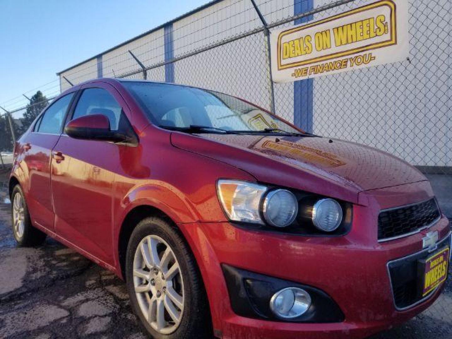 2012 Victory Red Chevrolet Sonic 2LT Sedan (1G1JC5SH9C4) with an 1.8L L4 DOHC 24V engine, 6-Speed Automatic transmission, located at 1821 N Montana Ave., Helena, MT, 59601, (406) 422-1031, 0.000000, 0.000000 - Photo#2