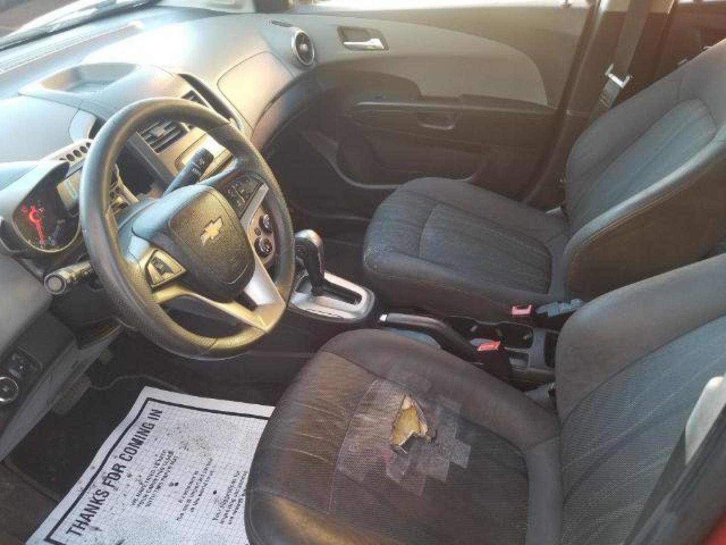 2012 Victory Red Chevrolet Sonic 2LT Sedan (1G1JC5SH9C4) with an 1.8L L4 DOHC 24V engine, 6-Speed Automatic transmission, located at 1821 N Montana Ave., Helena, MT, 59601, (406) 422-1031, 0.000000, 0.000000 - Photo#7