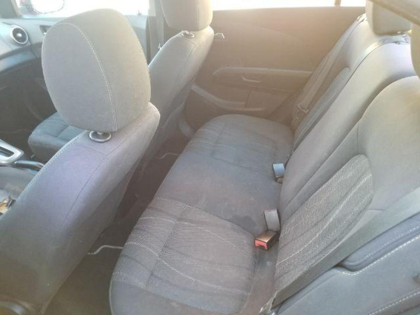 2012 Victory Red Chevrolet Sonic 2LT Sedan (1G1JC5SH9C4) with an 1.8L L4 DOHC 24V engine, 6-Speed Automatic transmission, located at 1821 N Montana Ave., Helena, MT, 59601, (406) 422-1031, 0.000000, 0.000000 - Photo#8
