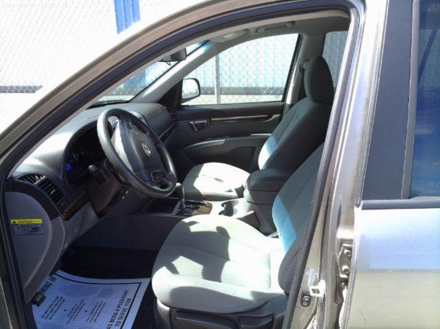 2012 Hyundai Tucson GLS (KM8JUCAC7CU) with an Theta II 2.4L I-4 DOHC engine, located at 4801 10th Ave S,, Great Falls, MT, 59405, 0.000000, 0.000000 - Photo#5
