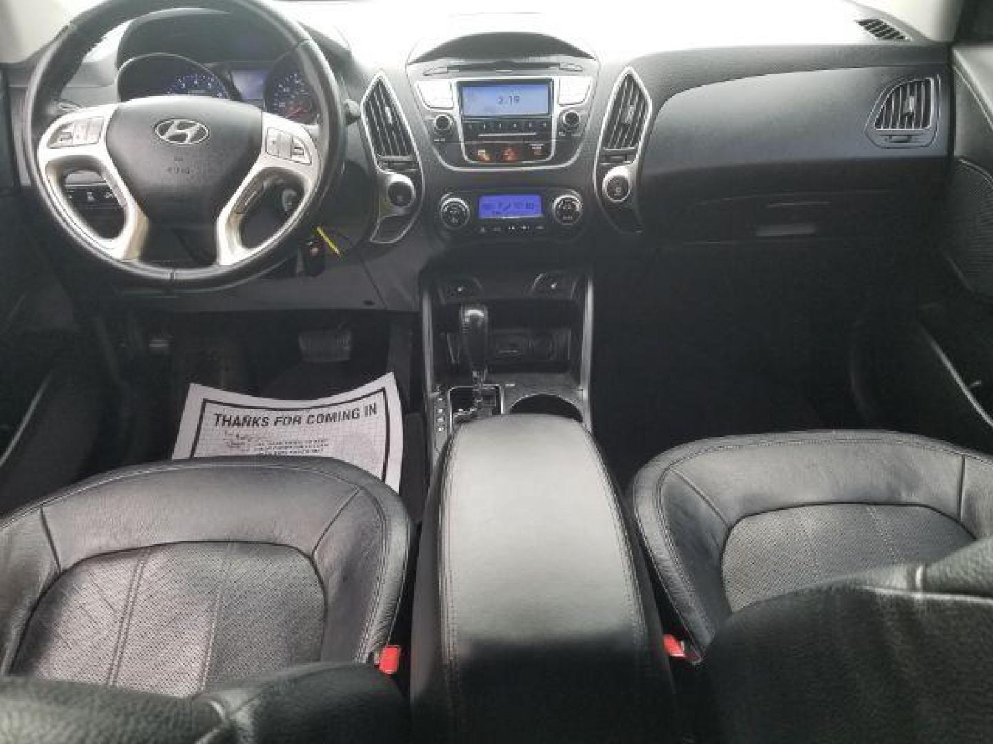 2012 Hyundai Tucson Limited (KM8JUCAC8CU) with an Theta II 2.4L I-4 DOHC engine, located at 1800 West Broadway, Missoula, 59808, (406) 543-1986, 46.881348, -114.023628 - Photo#10