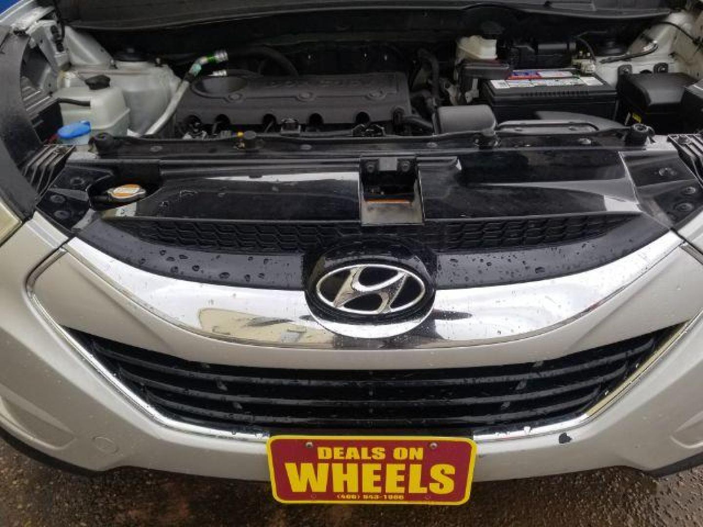 2012 Hyundai Tucson Limited (KM8JUCAC8CU) with an Theta II 2.4L I-4 DOHC engine, located at 1800 West Broadway, Missoula, 59808, (406) 543-1986, 46.881348, -114.023628 - Photo#12