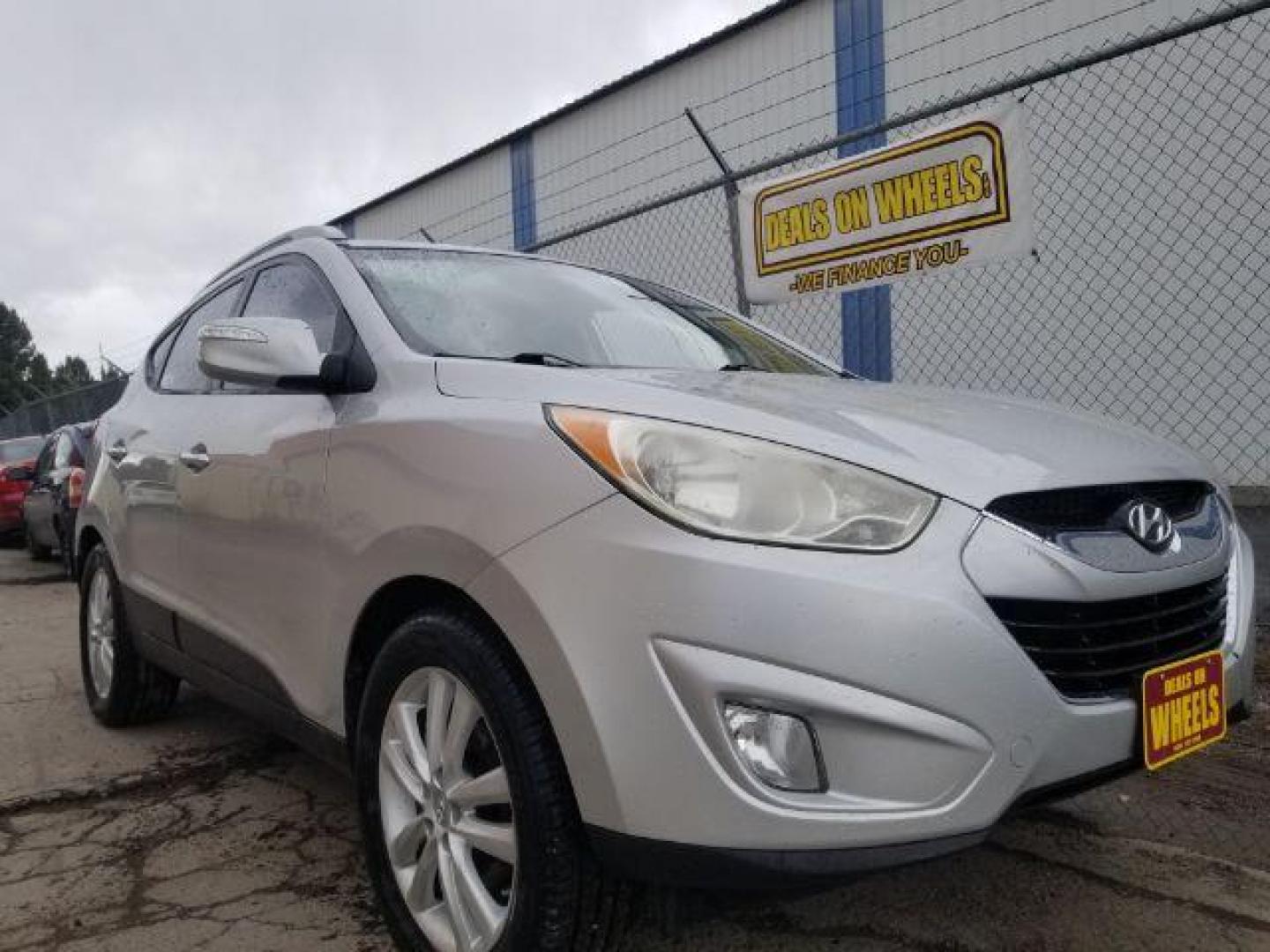2012 Hyundai Tucson Limited (KM8JUCAC8CU) with an Theta II 2.4L I-4 DOHC engine, located at 1800 West Broadway, Missoula, 59808, (406) 543-1986, 46.881348, -114.023628 - Photo#2