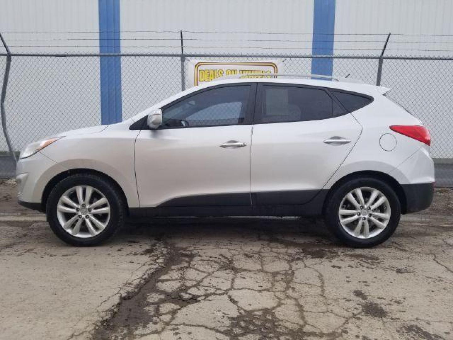 2012 Hyundai Tucson Limited (KM8JUCAC8CU) with an Theta II 2.4L I-4 DOHC engine, located at 1800 West Broadway, Missoula, 59808, (406) 543-1986, 46.881348, -114.023628 - Photo#5