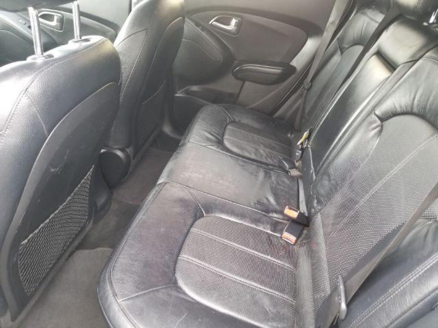2012 Hyundai Tucson Limited (KM8JUCAC8CU) with an Theta II 2.4L I-4 DOHC engine, located at 1800 West Broadway, Missoula, 59808, (406) 543-1986, 46.881348, -114.023628 - Photo#7