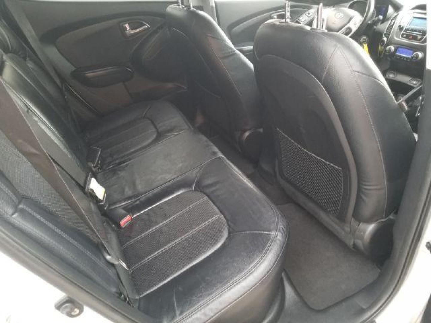 2012 Hyundai Tucson Limited (KM8JUCAC8CU) with an Theta II 2.4L I-4 DOHC engine, located at 1800 West Broadway, Missoula, 59808, (406) 543-1986, 46.881348, -114.023628 - Photo#8