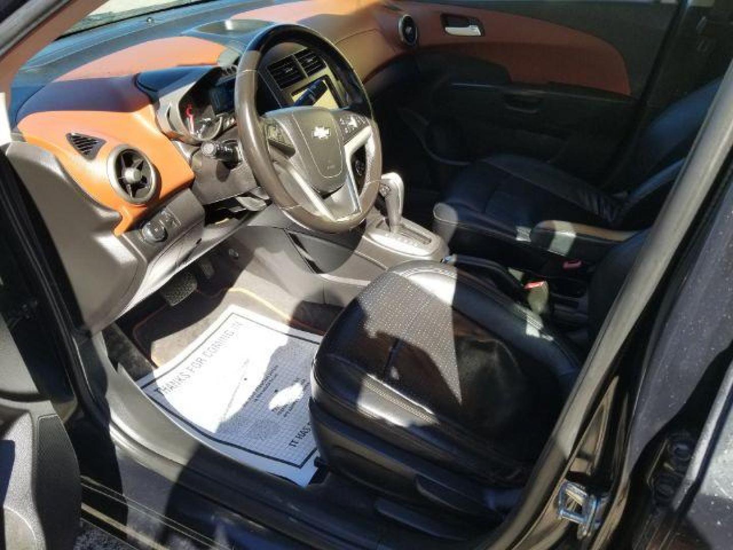 2013 Chevrolet Sonic LTZ Auto Sedan (1G1JE5SB4D4) with an 1.4L L4 DOHC 24V TUR engine, 6-Speed Automatic transmission, located at 601 E. Idaho St., Kalispell, MT, 59901, 0.000000, 0.000000 - Photo#7