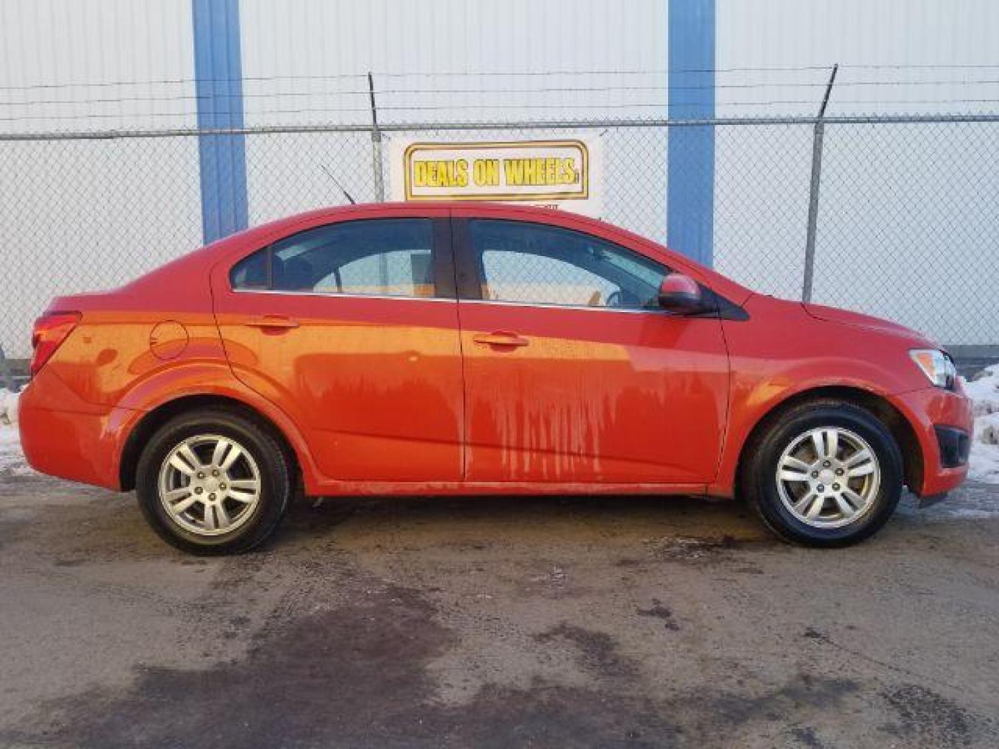 2013 Chevrolet Sonic LT Manual Sedan (1G1JD5SB1D4) with an 1.4L L4 DOHC 24V TURBO engine, 5-Speed Manual transmission, located at 1800 West Broadway, Missoula, 59808, (406) 543-1986, 46.881348, -114.023628 - Photo#3