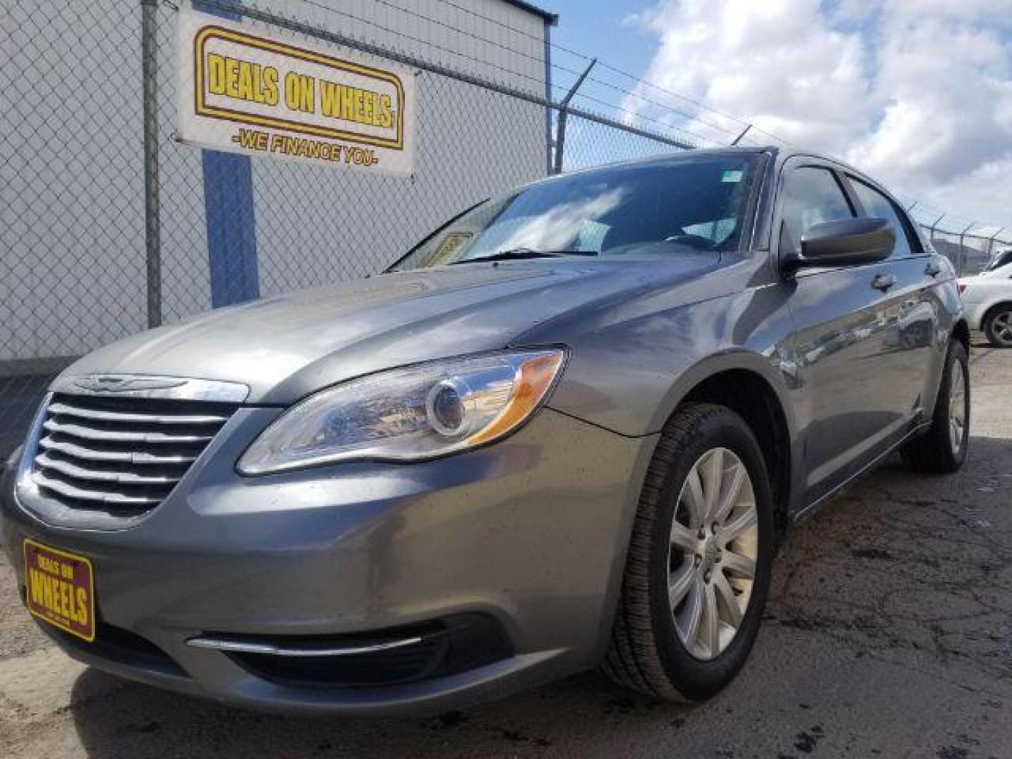 2013 Chrysler 200 Touring (1C3CCBBB6DN) with an 2.4L I-4 DOHC engine, located at 4047 Montana Ave., Billings, MT, 59101, 45.770847, -108.529800 - Photo#0