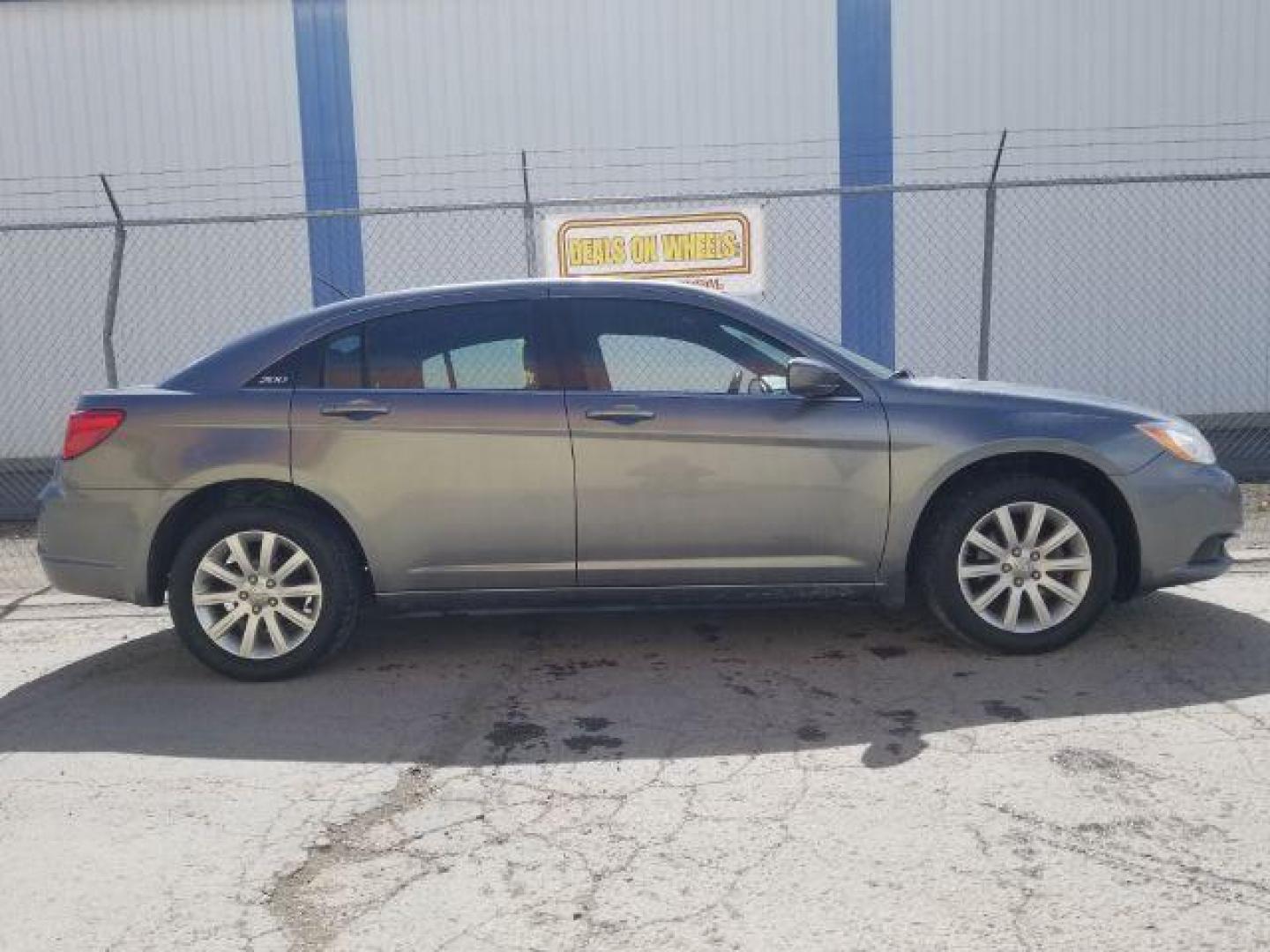 2013 Chrysler 200 Touring (1C3CCBBB6DN) with an 2.4L I-4 DOHC engine, located at 4047 Montana Ave., Billings, MT, 59101, 45.770847, -108.529800 - Photo#3