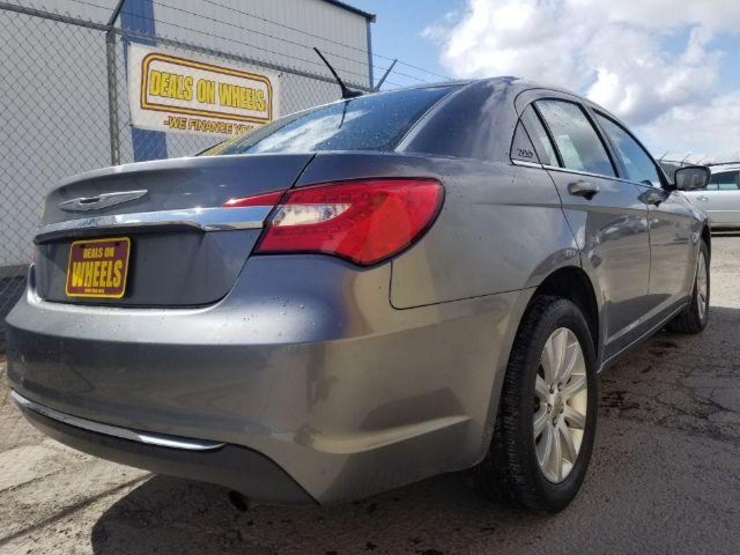 2013 Chrysler 200 Touring (1C3CCBBB6DN) with an 2.4L I-4 DOHC engine, located at 4047 Montana Ave., Billings, MT, 59101, 45.770847, -108.529800 - Photo#4