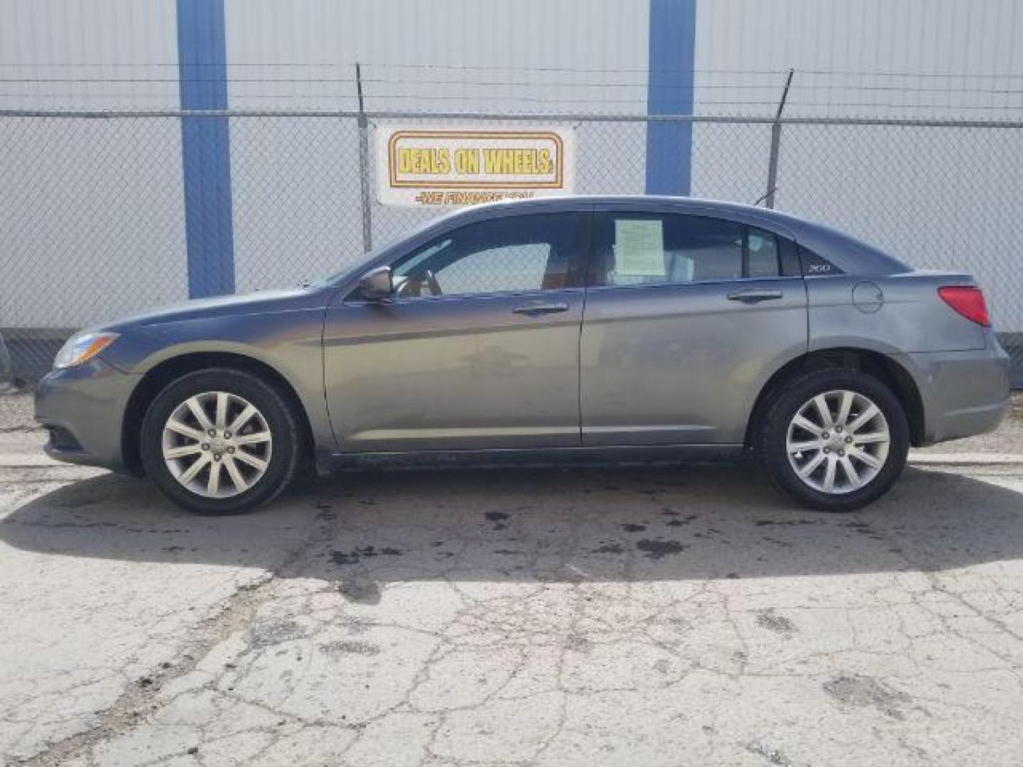 2013 Chrysler 200 Touring (1C3CCBBB6DN) with an 2.4L I-4 DOHC engine, located at 4047 Montana Ave., Billings, MT, 59101, 45.770847, -108.529800 - Photo#6
