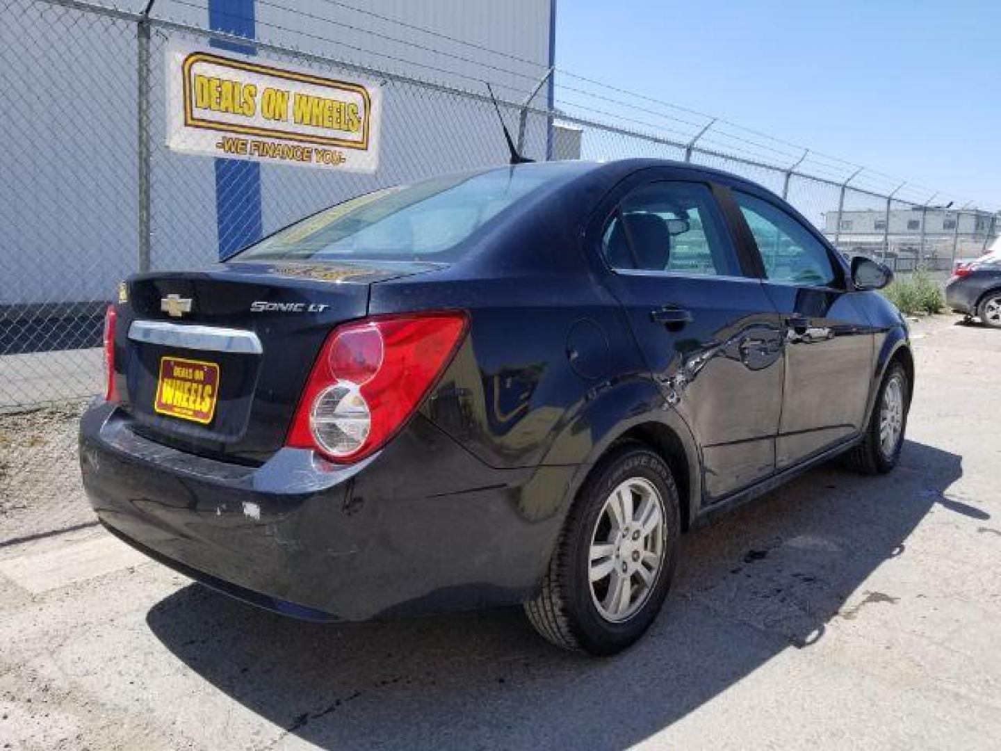 2014 Chevrolet Sonic LT Auto Sedan (1G1JC5SH7E4) with an 1.8L L4 DOHC 24V engine, 6-Speed Automatic transmission, located at 1821 N Montana Ave., Helena, MT, 59601, (406) 422-1031, 0.000000, 0.000000 - Photo#4