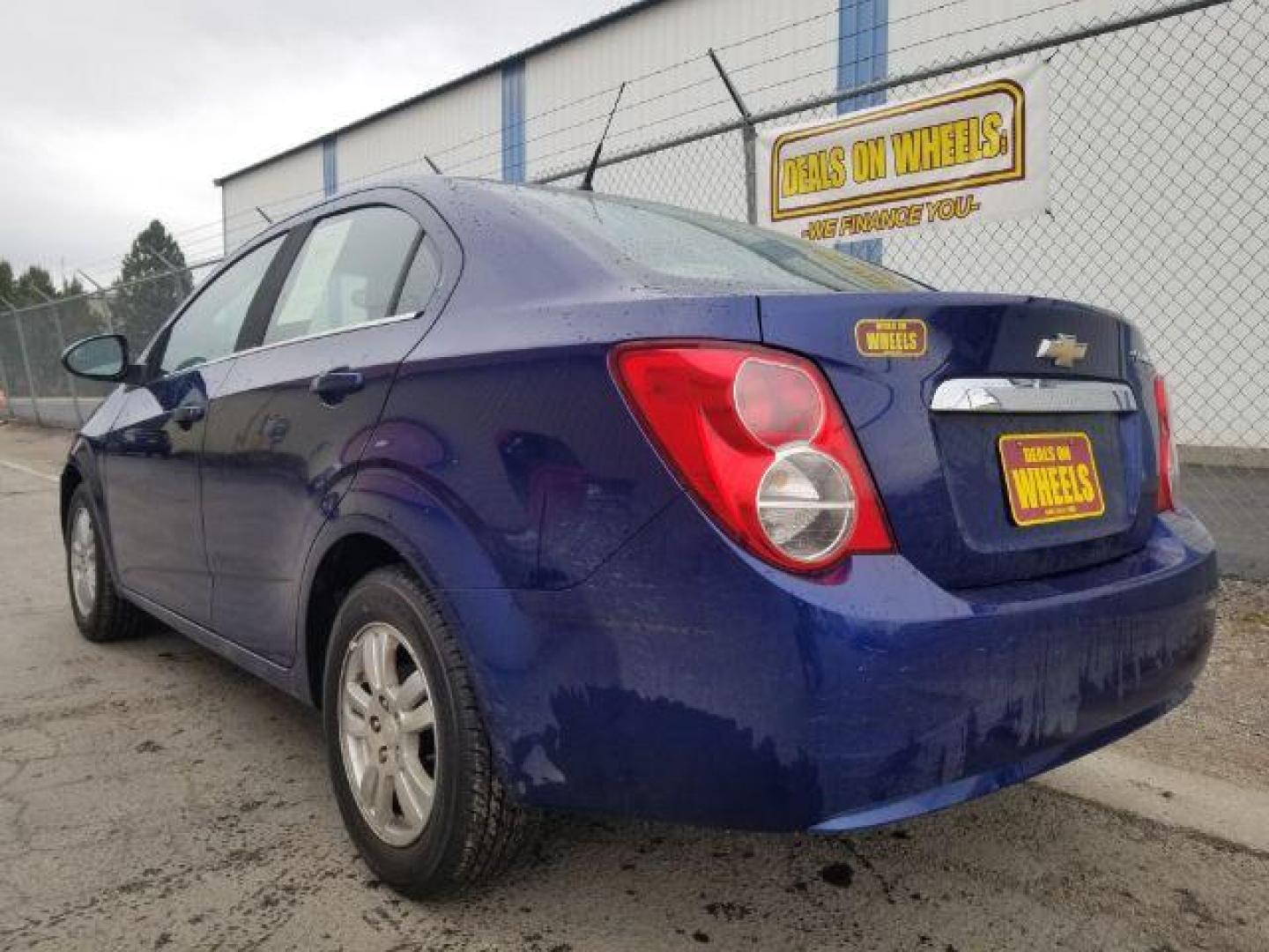 2014 Chevrolet Sonic LT Auto Sedan (1G1JC5SH7E4) with an 1.8L L4 DOHC 24V engine, 6-Speed Automatic transmission, located at 601 E. Idaho St., Kalispell, MT, 59901, 0.000000, 0.000000 - Photo#5