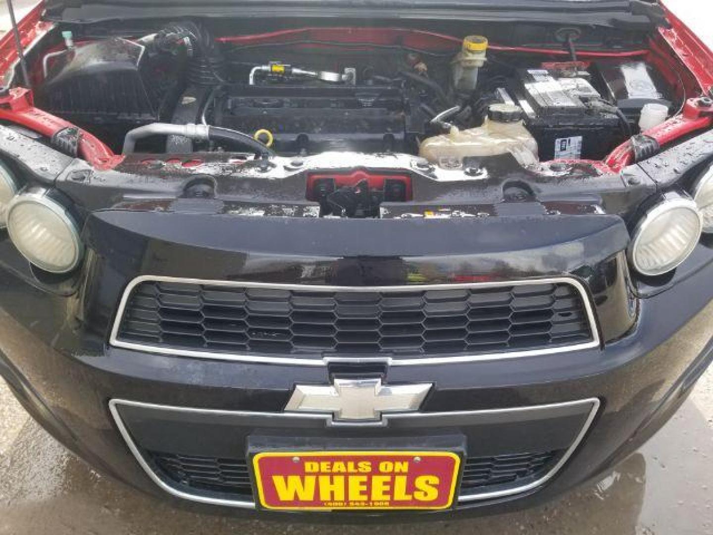 2014 Chevrolet Sonic LT Auto Sedan (1G1JC5SH1E4) with an 1.8L L4 DOHC 24V engine, 6-Speed Automatic transmission, located at 1800 West Broadway, Missoula, 59808, (406) 543-1986, 46.881348, -114.023628 - Photo#13