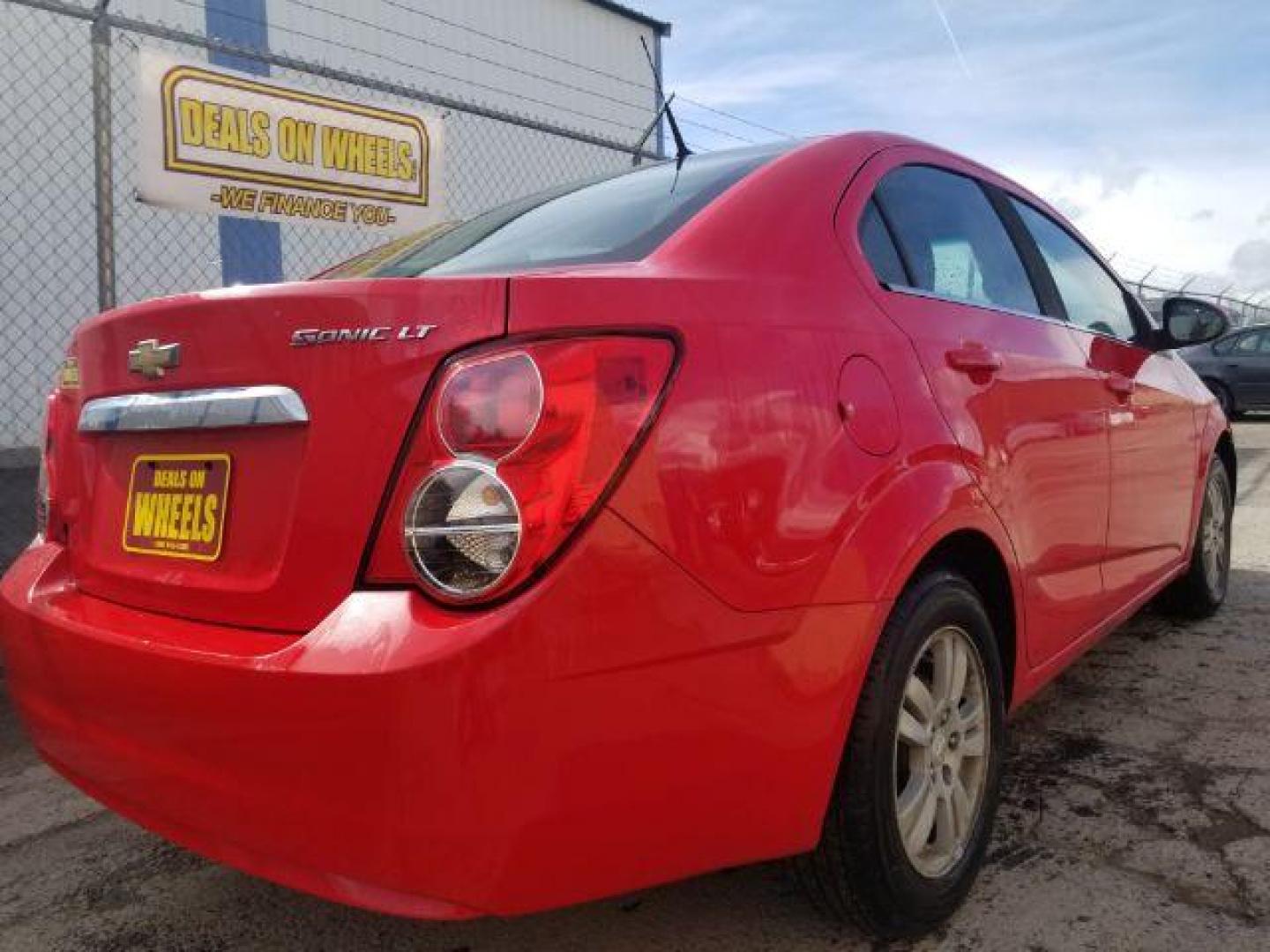 2014 Chevrolet Sonic LT Auto Sedan (1G1JC5SH1E4) with an 1.8L L4 DOHC 24V engine, 6-Speed Automatic transmission, located at 1800 West Broadway, Missoula, 59808, (406) 543-1986, 46.881348, -114.023628 - Photo#4