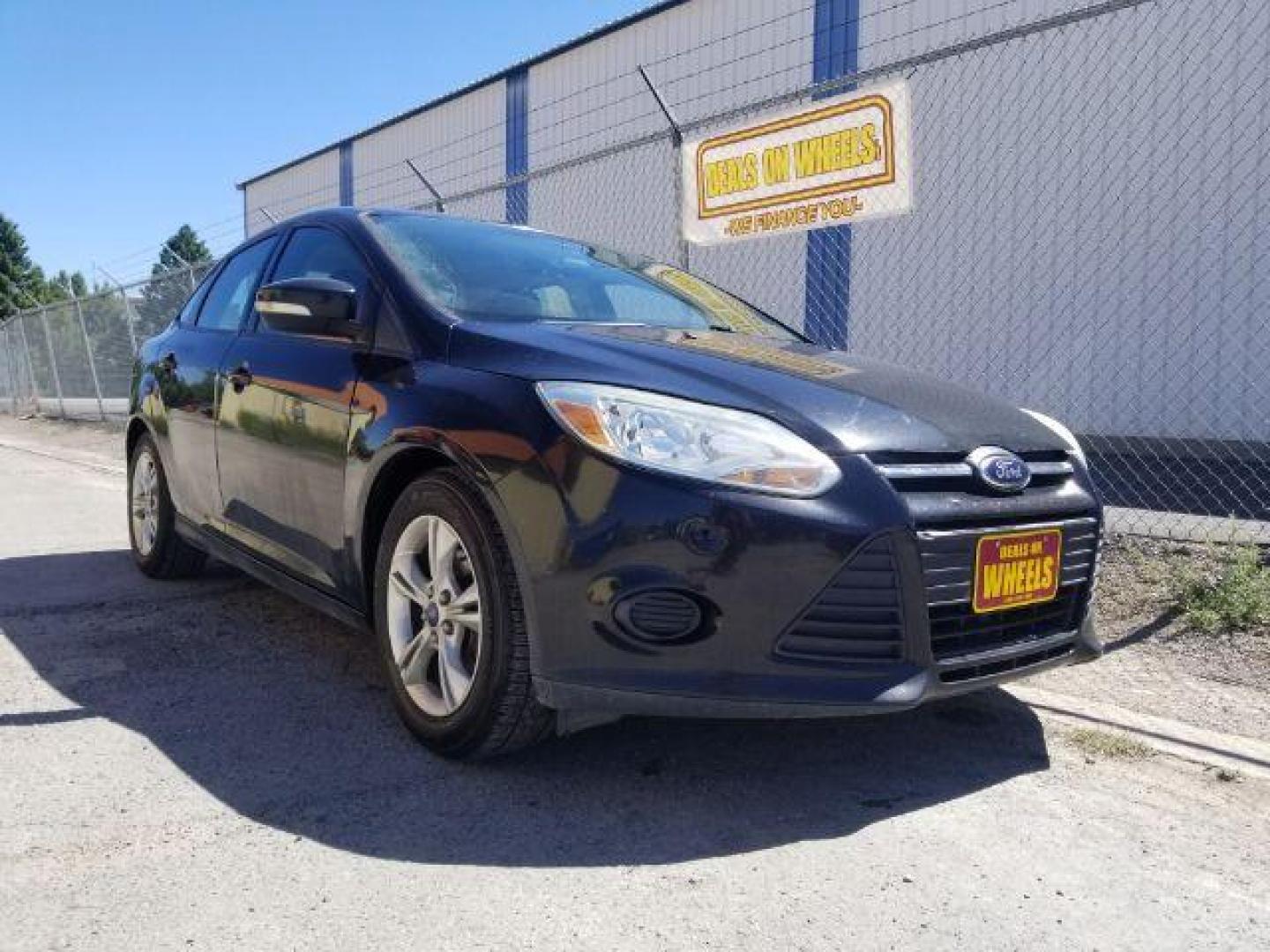 2014 Ford Focus SE Sedan (1FADP3F20EL) with an 2.0L L4 DOHC 16V engine, located at 4801 10th Ave S,, Great Falls, MT, 59405, 0.000000, 0.000000 - Photo#13