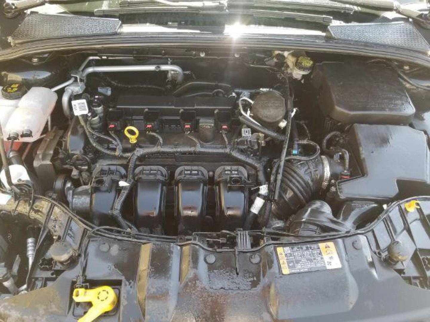 2014 Ford Focus SE Sedan (1FADP3F20EL) with an 2.0L L4 DOHC 16V engine, located at 4801 10th Ave S,, Great Falls, MT, 59405, 0.000000, 0.000000 - Photo#4
