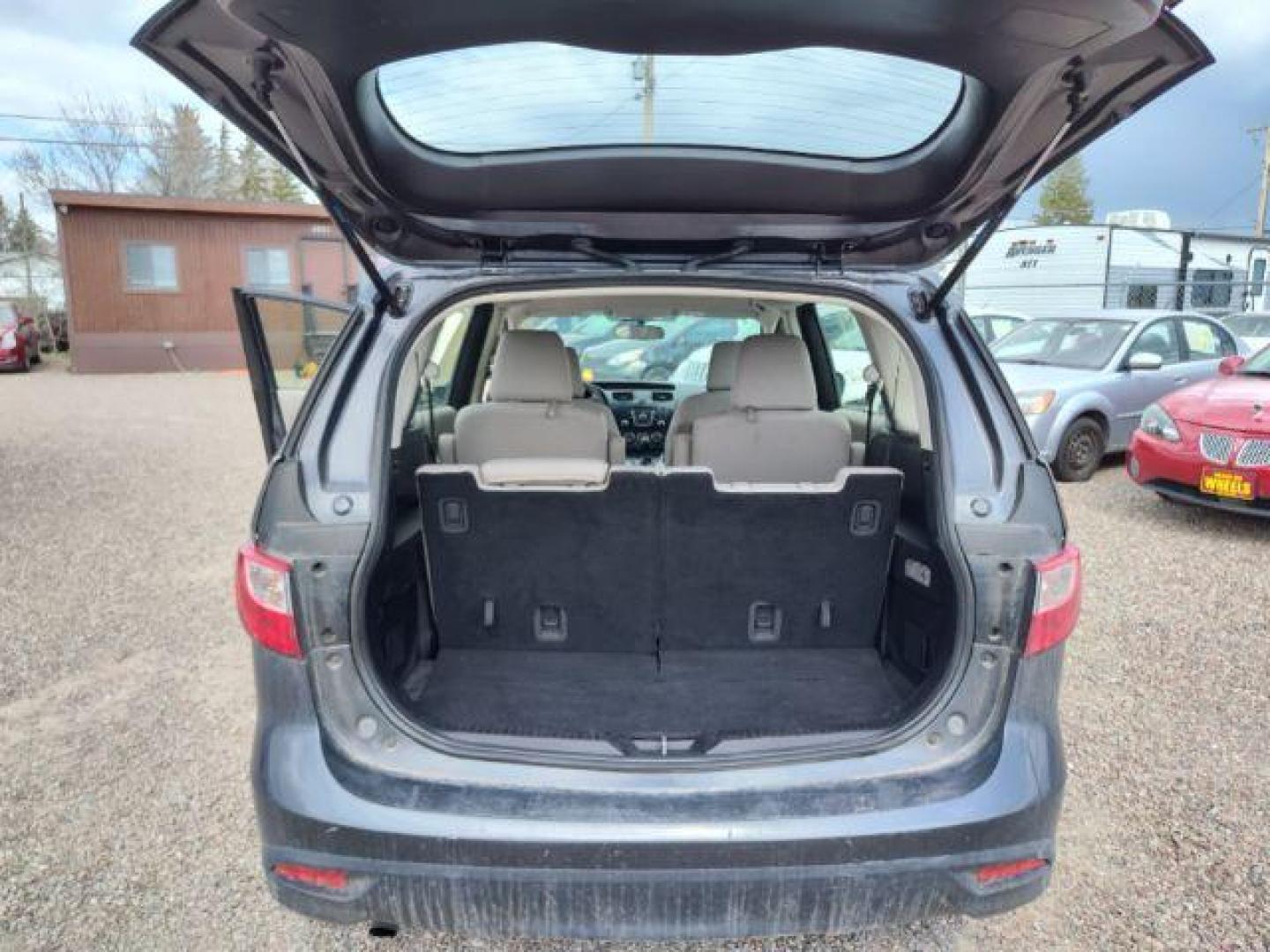 2014 Mazda MAZDA5 Sport AT (JM1CW2BL5E0) with an 2.5L L4 DOHC 16V engine, 5-Speed Automatic transmission, located at 4801 10th Ave S,, Great Falls, MT, 59405, 0.000000, 0.000000 - Photo#13