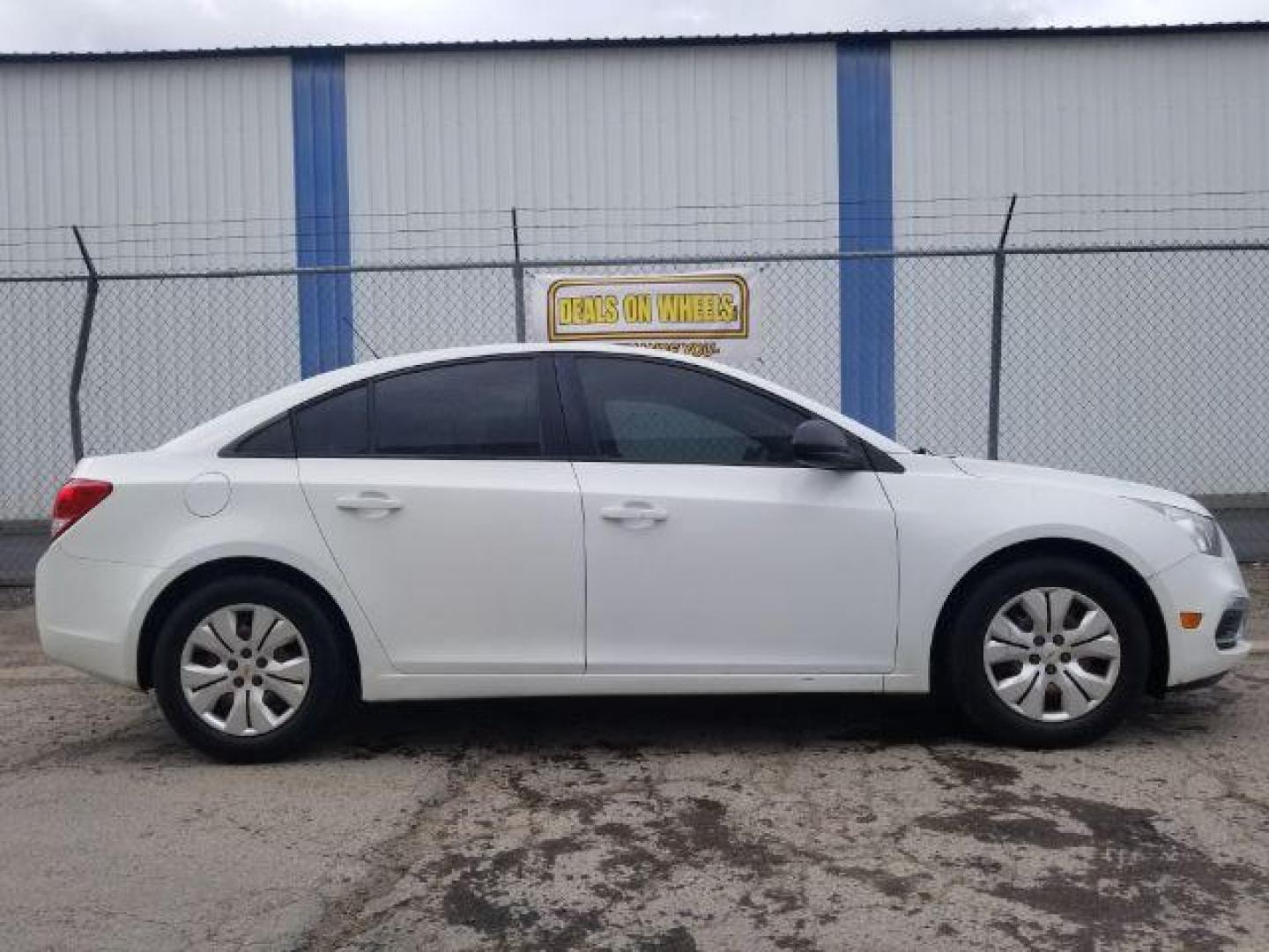 2016 Summit White Chevrolet Cruze Limited LS Auto (1G1PC5SG6G7) with an 1.8L L4 DOHC 16V FFV engine, 6-Speed Automatic transmission, located at 4047 Montana Ave., Billings, MT, 59101, 45.770847, -108.529800 - Photo#3