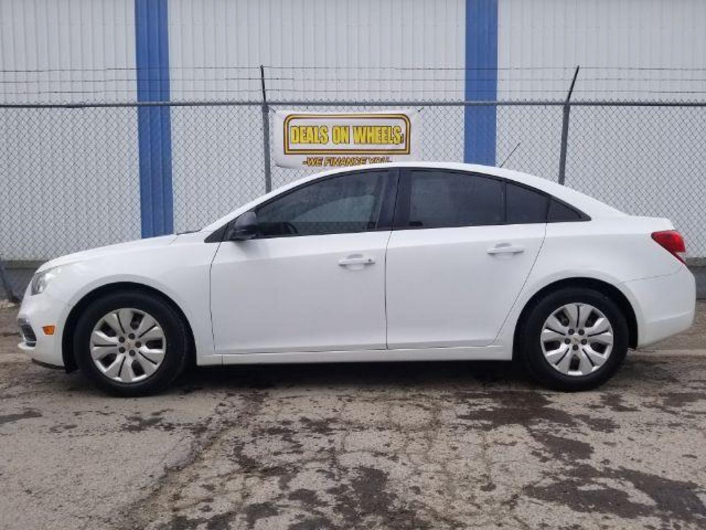 2016 Summit White Chevrolet Cruze Limited LS Auto (1G1PC5SG6G7) with an 1.8L L4 DOHC 16V FFV engine, 6-Speed Automatic transmission, located at 4047 Montana Ave., Billings, MT, 59101, 45.770847, -108.529800 - Photo#6