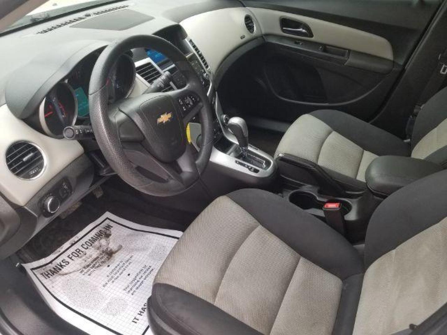 2016 Summit White Chevrolet Cruze Limited LS Auto (1G1PC5SG6G7) with an 1.8L L4 DOHC 16V FFV engine, 6-Speed Automatic transmission, located at 4047 Montana Ave., Billings, MT, 59101, 45.770847, -108.529800 - Photo#7