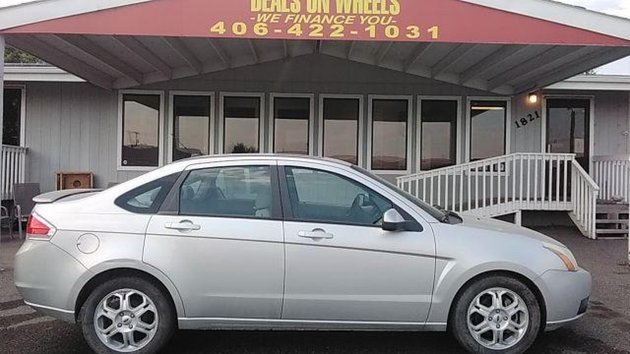 2009 Brilliant Silver Met Ford Focus SES Sedan (1FAHP36N89W) with an 2.0L L4 DOHC 16V engine, located at 1821 N Montana Ave, Helena, MT, 59601, (406) 422-1031, 46.603447, -112.022781 - Photo #3