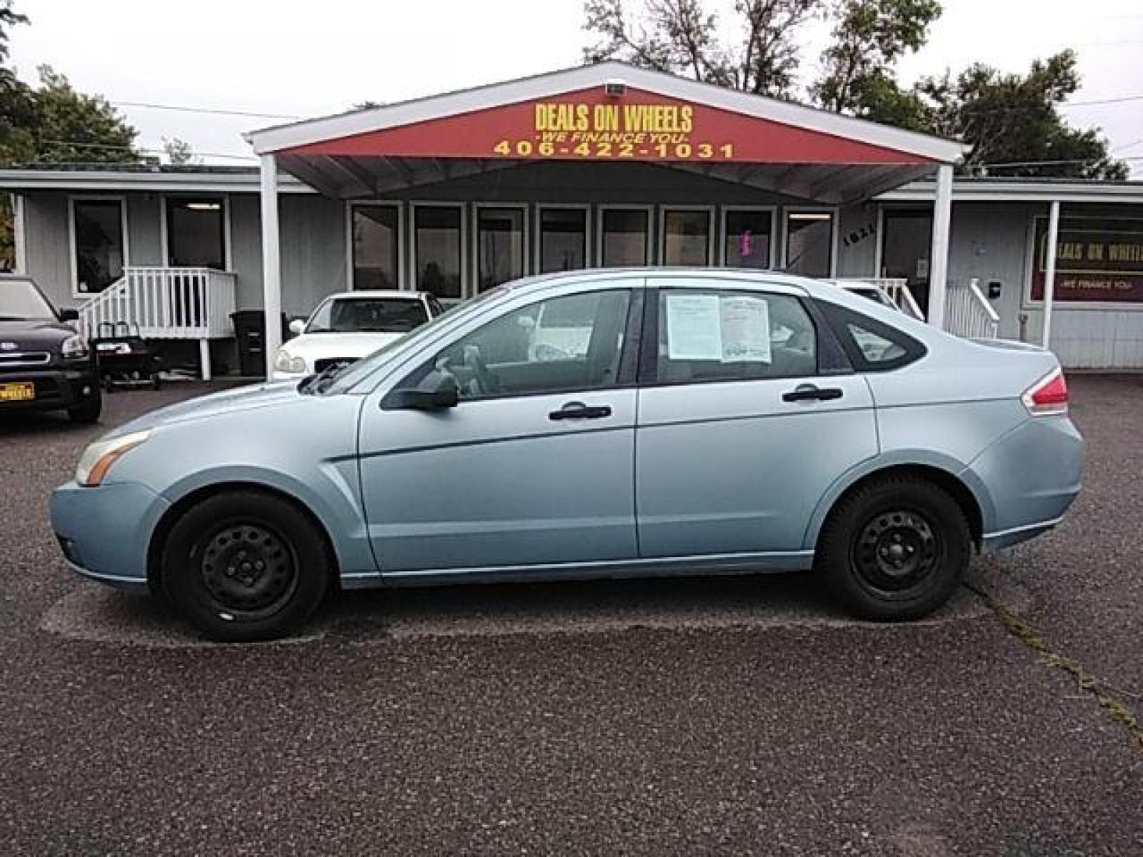 2008 Vista Blue Metallic Ford Focus S Sedan (1FAHP34N78W) with an 2.0L L4 DOHC 16V engine, 4-Speed Automatic transmission, located at 1821 N Montana Ave, Helena, MT, 59601, (406) 543-1986, 46.603153, -112.020531 - Photo #0