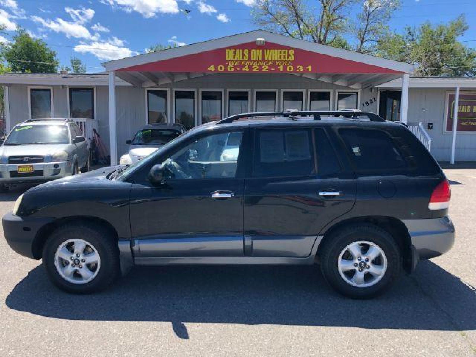 2005 Hyundai Santa Fe GLS 3.5L 4WD (KM8SC73E35U) with an 3.5L V6 DOHC 24V engine, 5-Speed Automatic transmission, located at 1821 N Montana Ave, Helena, MT, 59601, (406) 543-1986, 46.603153, -112.020531 - Photo #0