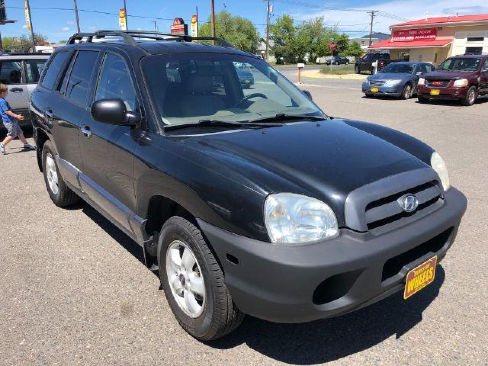 2005 Hyundai Santa Fe GLS 3.5L 4WD (KM8SC73E35U) with an 3.5L V6 DOHC 24V engine, 5-Speed Automatic transmission, located at 1821 N Montana Ave, Helena, MT, 59601, (406) 543-1986, 46.603153, -112.020531 - Photo #2