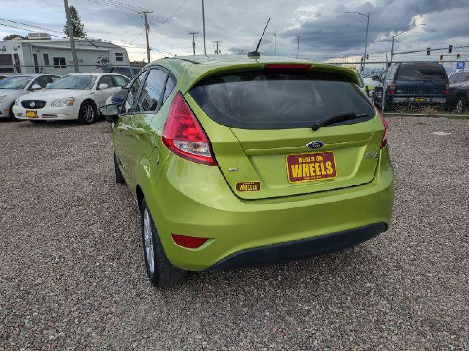 2011 Ford Fiesta SE Hatchback (3FADP4EJ1BM) with an 1.6L L4 DOHC 16V engine, located at 4801 10th Ave S,, Great Falls, MT, 59405, (406) 564-1505, 47.494347, -111.232239 - Photo #2
