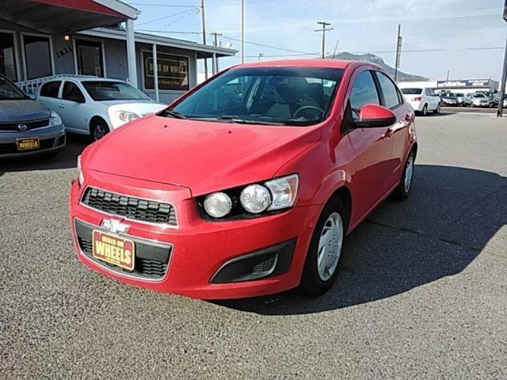 2015 Red Hot Chevrolet Sonic LS Auto Sedan (1G1JA5SH2F4) with an 1.8L L4 DOHC 24V engine, 6-Speed Automatic transmission, located at 1821 N Montana Ave, Helena, MT, 59601, (406) 543-1986, 46.603153, -112.020531 - Photo #2
