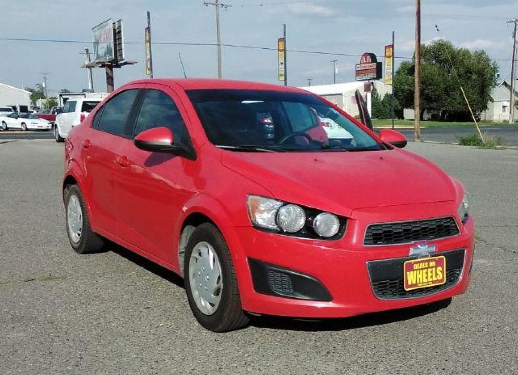 2015 Red Hot Chevrolet Sonic LS Auto Sedan (1G1JA5SH2F4) with an 1.8L L4 DOHC 24V engine, 6-Speed Automatic transmission, located at 1821 N Montana Ave, Helena, MT, 59601, (406) 543-1986, 46.603153, -112.020531 - Photo #3