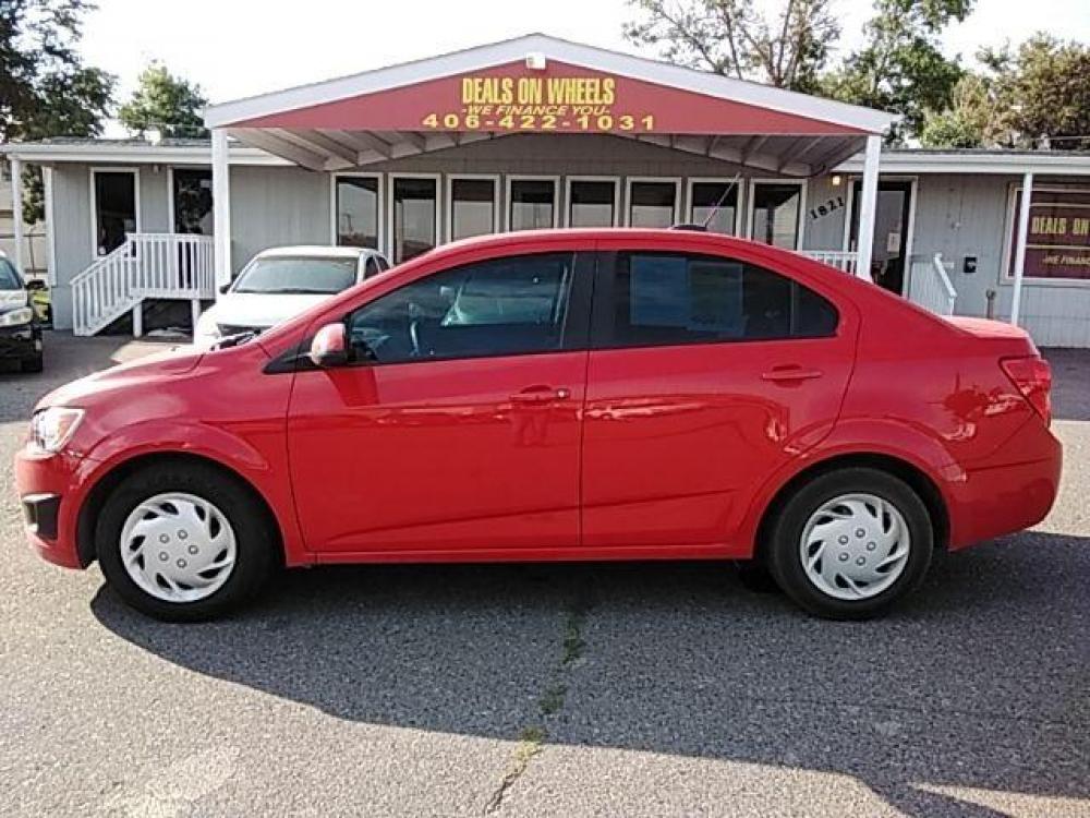 2015 Red Hot Chevrolet Sonic LS Auto Sedan (1G1JA5SH2F4) with an 1.8L L4 DOHC 24V engine, 6-Speed Automatic transmission, located at 1821 N Montana Ave, Helena, MT, 59601, (406) 543-1986, 46.603153, -112.020531 - Photo #0