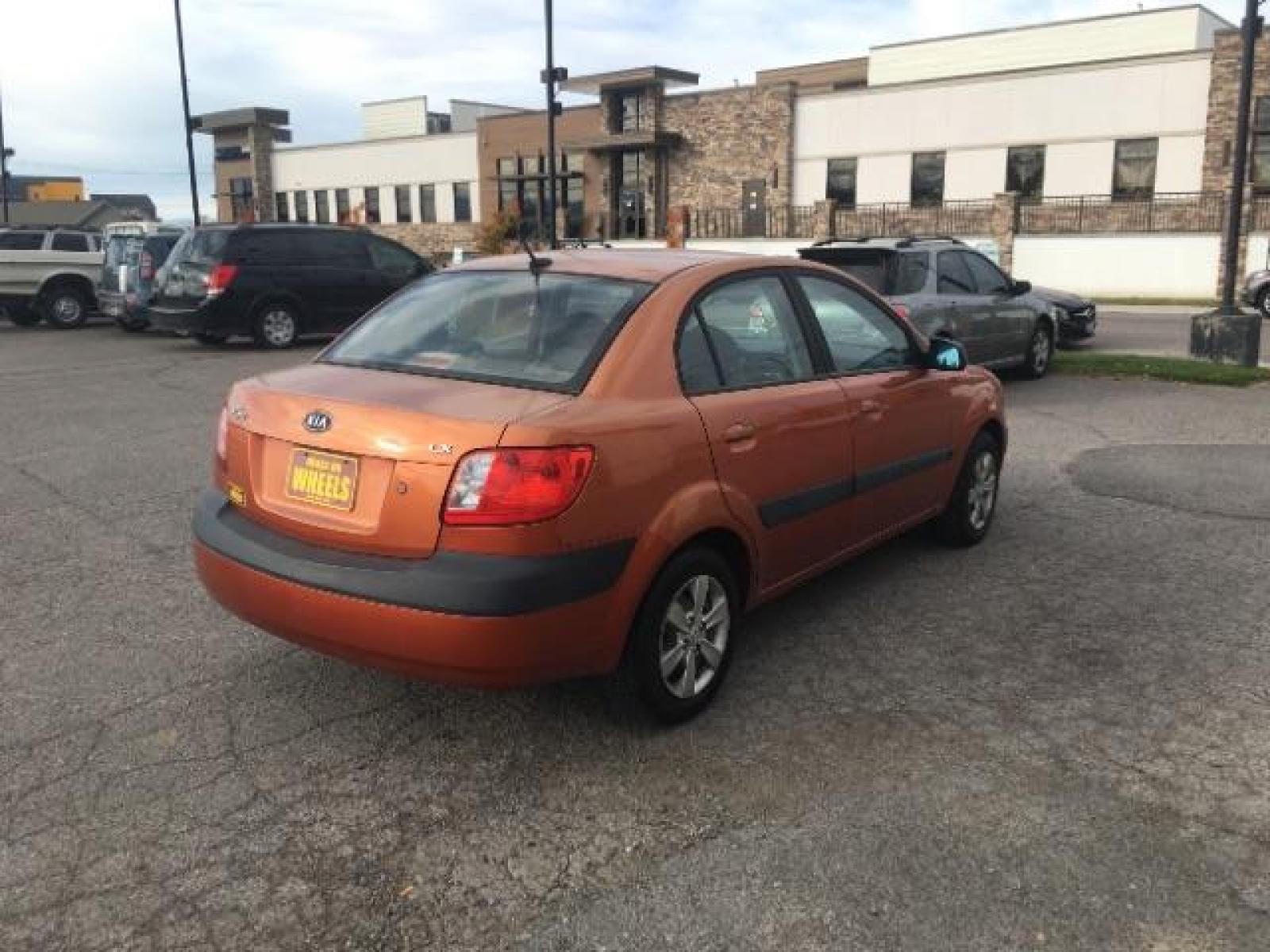 2009 Kia Rio Base (KNADE223696) with an 1.6L L4 DOHC 16V engine, Automatic transmission transmission, located at 1821 N Montana Ave, Helena, MT, 59601, (406) 543-1986, 46.603153, -112.020531 - Photo #4