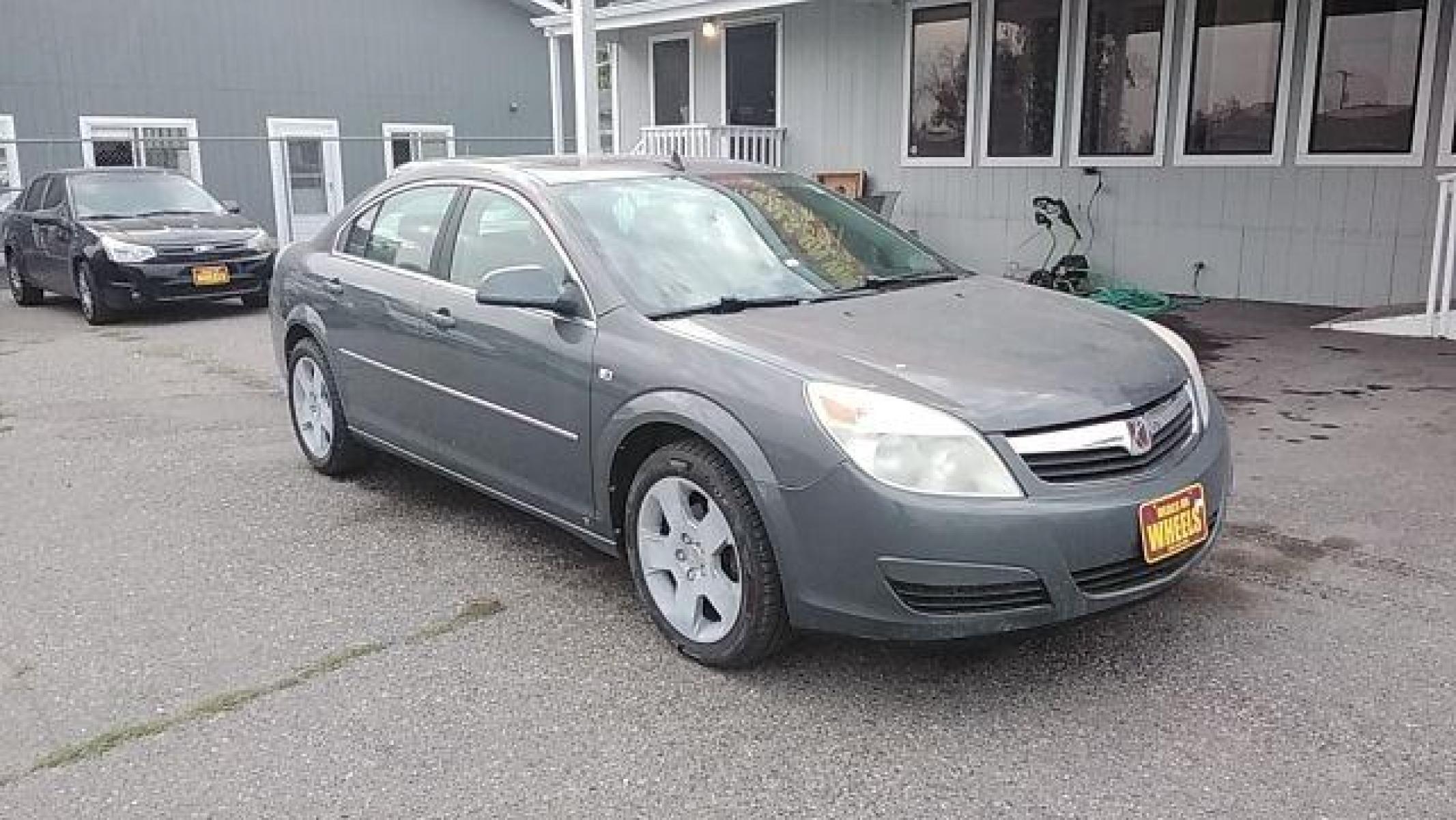 2008 Silver Pearl Saturn Aura XE (1G8ZS57B58F) with an 2.4L L4 DOHC 16V engine, 4-Speed Automatic transmission, located at 1821 N Montana Ave, Helena, MT, 59601, (406) 422-1031, 46.603447, -112.022781 - Photo #2