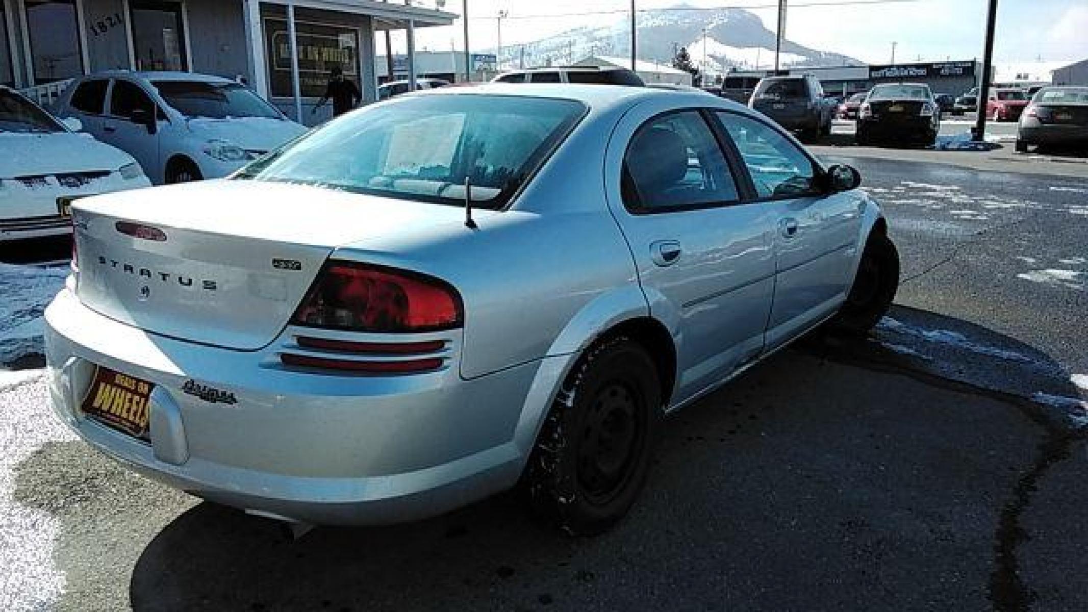 2006 Silver Steel Metallic /Dark Slate Gray Cloth Interior Dodge Stratus SXT (1B3EL46X46N) with an 2.4L L4 DOHC 16V engine, 4-Speed Automatic transmission, located at 1821 N Montana Ave, Helena, MT, 59601, (406) 543-1986, 46.603153, -112.020531 - Photo #1